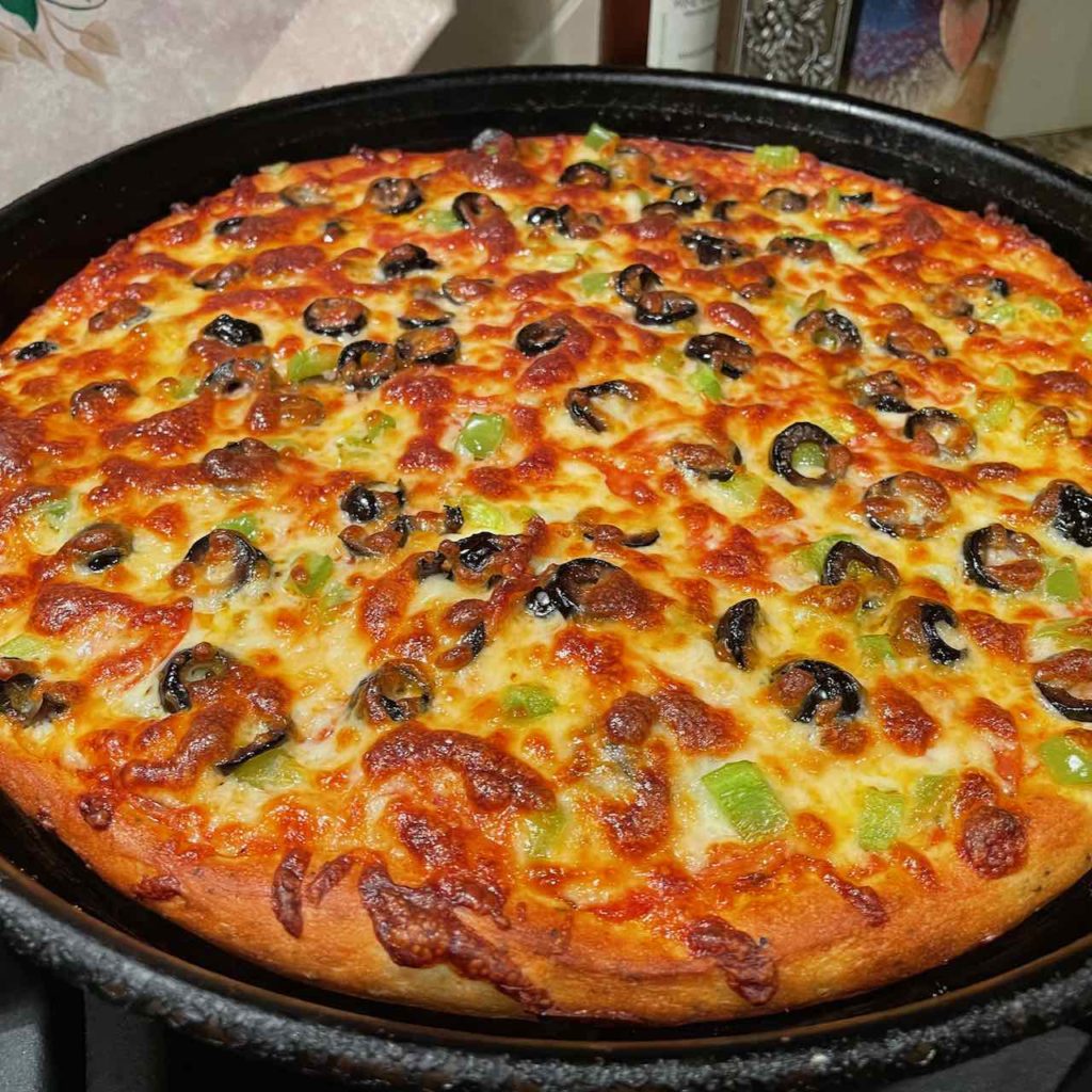 Pizza baked in a pizza pan